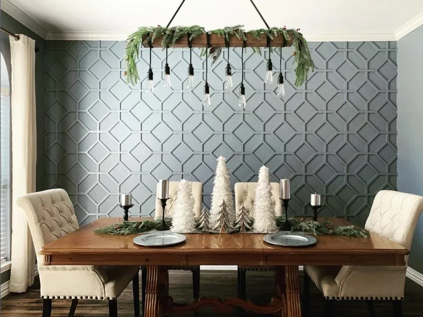 A dining room with a table and chairs and a chandelier.